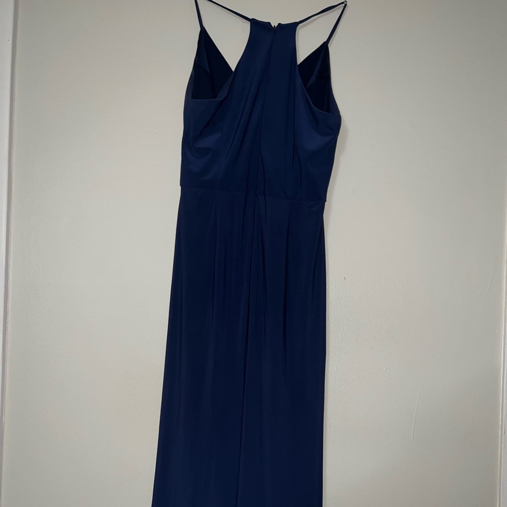 This dress is from davids bridal. It is a size 12 but can be hemmed to fit. - Picture 2 of 2